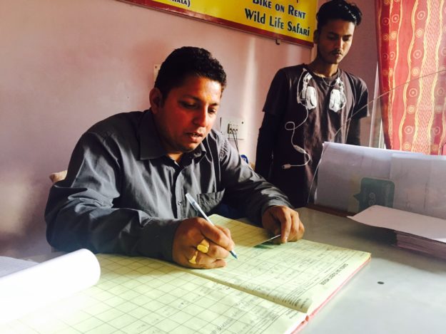 Signing the guest log