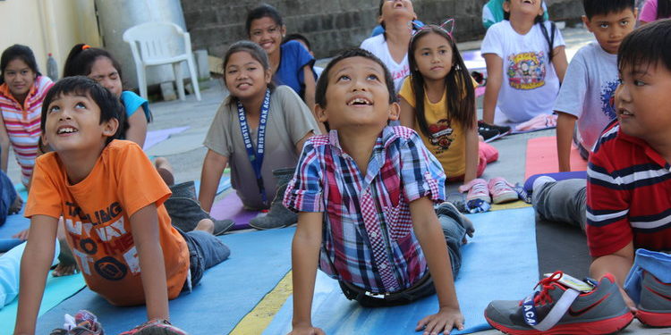 Kids at a Let's Imagine yoga camp